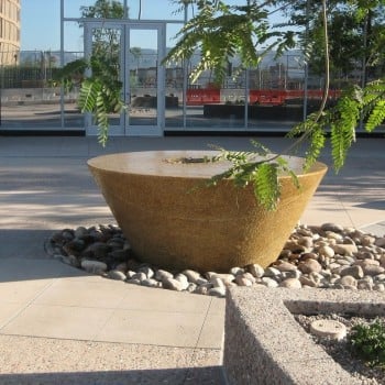 Core-Drilled Gobi Tan Granite with Perfectly Level Surface for Laminar Water Flow - HDG Building Materials