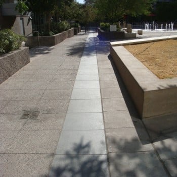 Butterfly Black Basalt Square Pavers in Ribbon use a Flamed and Brushed Finish - CityScape - HDG Building Materials