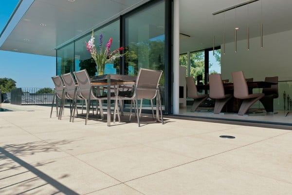 HDG Outdoor Porcelain Pavers in Dining Area with Glass Moveable Wall - HDG Building Materials
