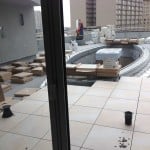 Canal Street Rooftop Pool Terrace with Buzon Pedestals and 24x24 inch Porcelain Pavers