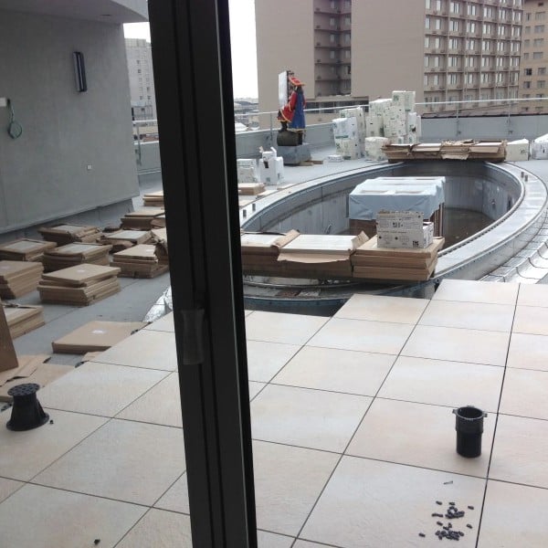Canal Street Rooftop Pool Terrace with Buzon Pedestals and 24x24 inch Porcelain Pavers