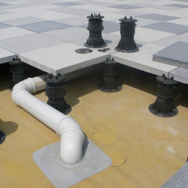 Buzon Pedestals and Stone Tile with Access to Services Below - HDG Building Materials Buzon Pedestals Projects