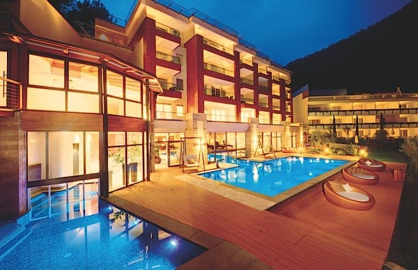 Resysta TruGrain Decking Quellenhof Pool at Night - HDG Building Material