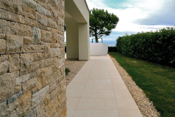 Pietra Crema stone-look outdoor porcelain pavers from HDG Building Materials.