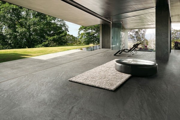 Seamless Indoor Outdoor Transition with Geyser Quartzite Porcelain Pavers from HDG Building Materials.