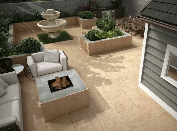 HDG NE Beige limestone-look porcelain pavers in courtyard.
