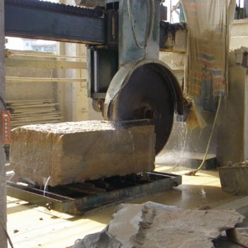 image of Giant Block of Stone Being Cut In HDG Building Materials Partner Factory in China
