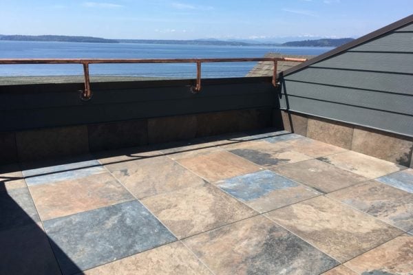 Waterfront rooftop deck with HDG Pietra Jamba Slate Porcelain Pavers