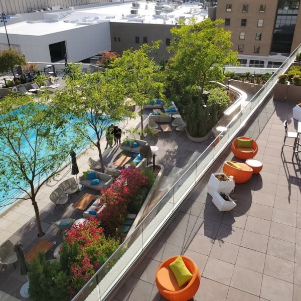 Terrace Overlooking Pool Deck Uses Buzon Pedestals and Concrete Pavers - HDG Building Materials