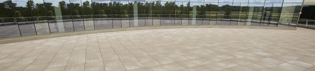 HDG Tech Series concrete pavers installed in a large building plaza.