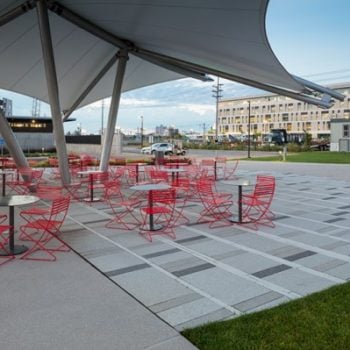 HDG Tech Fine Concrete Paver Next to Grass and Concrete
