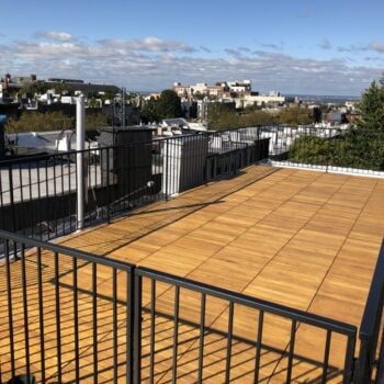 Buzon Pedestal Supported Black Locust Deck Tiles on Rooftop Deck