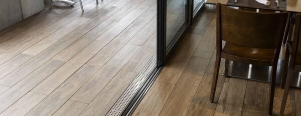 Espiro Indie Brown Wood Look Porcelain Paver Transition to Outdoor Dining Area Feature
