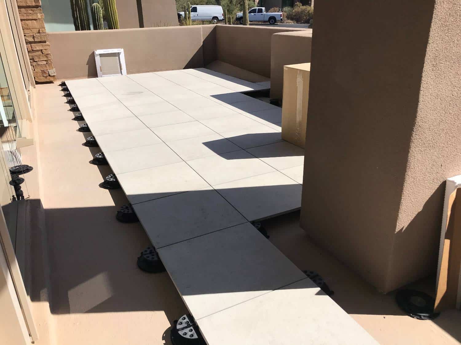 Installing Fusa Luna Porcelain Pavers Over Buzon Pedestals in Raised Floor Patio