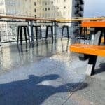 Rain Soaked Porcelain Rooftop Deck at Fort George Brewery