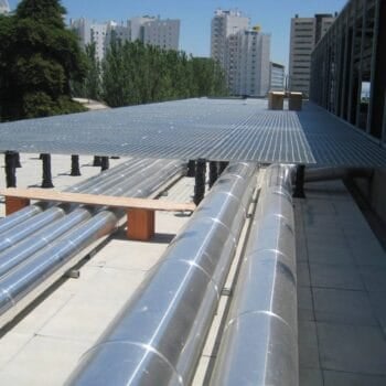 Using HDG Grating Panels Over Buzon Pedestals to Create Walkable Surface Over HVAC Ducts and Objects