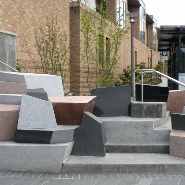 Variety of Natural Stone Block in Public Art - Athens Red Granite, Black Pearl Basalt, Bigio Grey Granite, Cristallo White Granite.