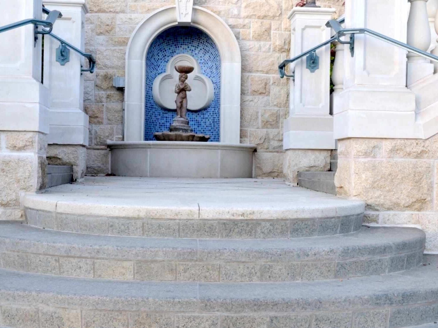 Granite stone pavers and stairs in a winery courtyard by HDG Building Materials