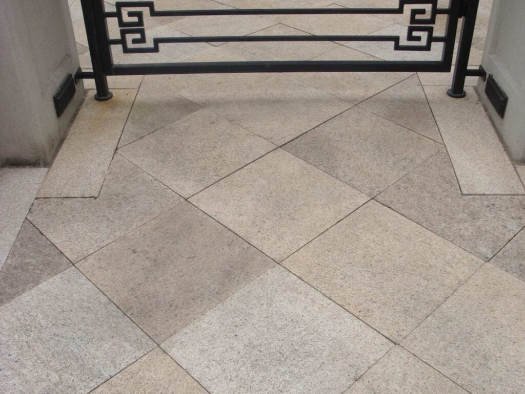 Luxury home with natural granite stone pavers and creates grand entrance - HDG Building Materials