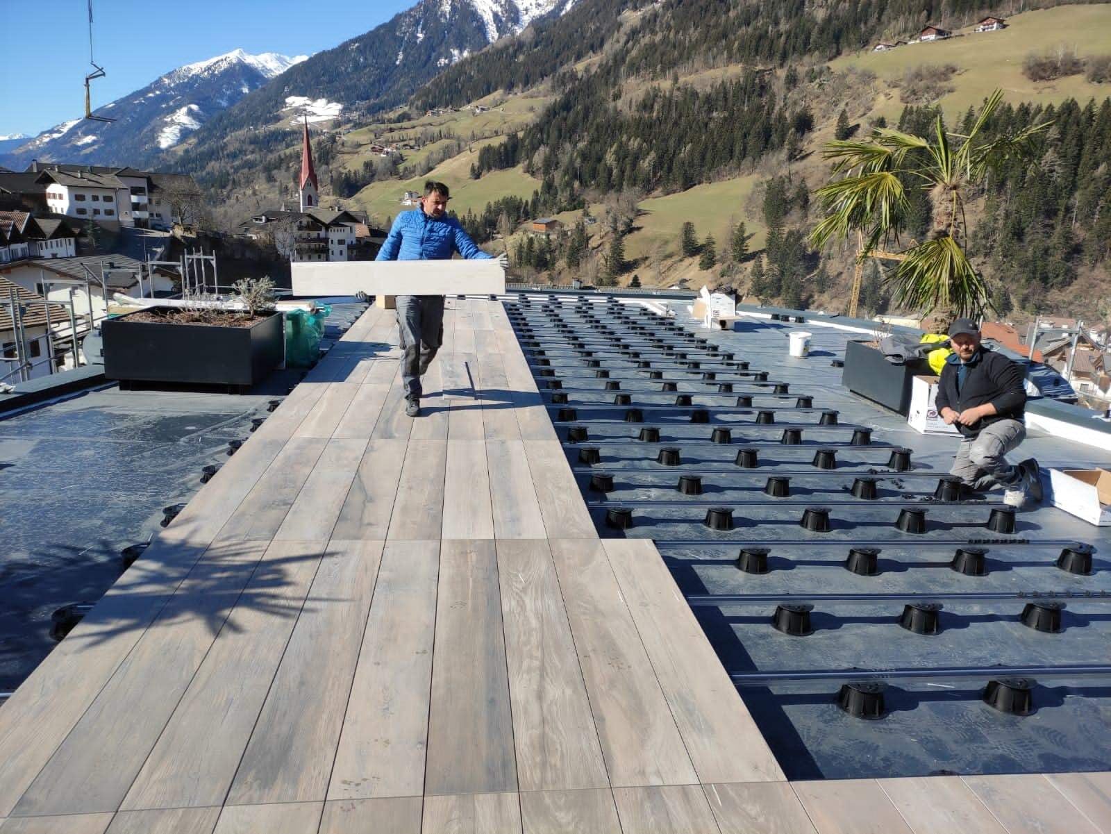 Buzon E-BRS Easy Rail System with Large Format Wood Look Porcelain Planks.