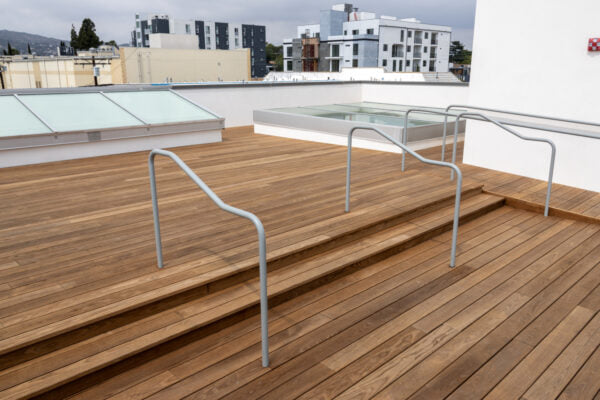 Rooftop Deck Showing Stairs and Accessible Ramp Using ThermoAsh Decking and Buzon Pedestals Close