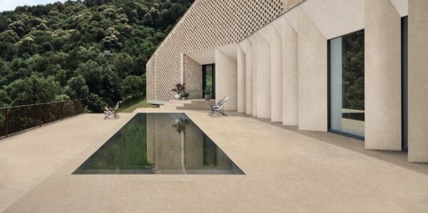 Slate Cream porcelain pavers create a pool surround at a luxury villa.