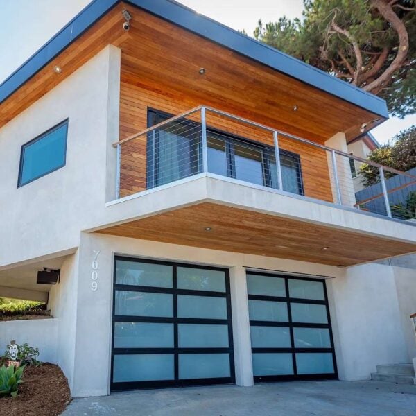 New home featuring Black Locust 1 × 5 siding, soffits, decking, and custom-milled wood details.