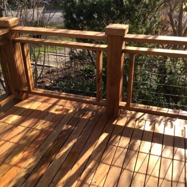 Black Locust decking and railing with finished post caps.