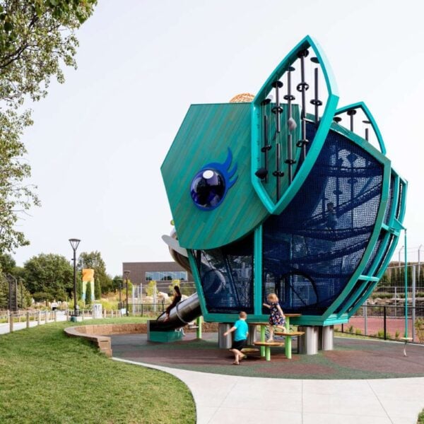 Green-painted Sassafras siding on playground structures at the Children’s Zoo in Lincoln, Nebraska.