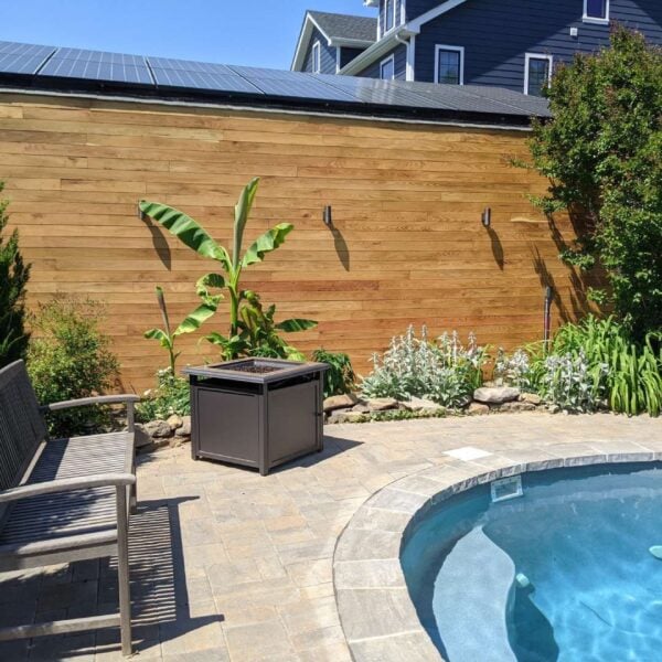 Sassafras 1 × 4 Nickel Gap siding finished with Robi Oil on a residential accent wall in Staten Island, New York.
