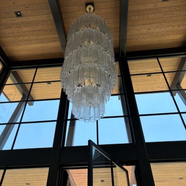 Sassafras 2 × 6 tongue-and-groove wood ceiling with Robi Blend finish on interior of a modern coastal home.