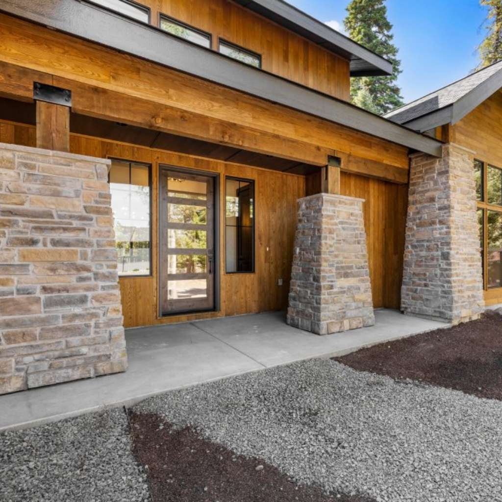 Upscale home featuring Sassafras 1 × 5 Nickel Gap siding with Robi Blend finish.